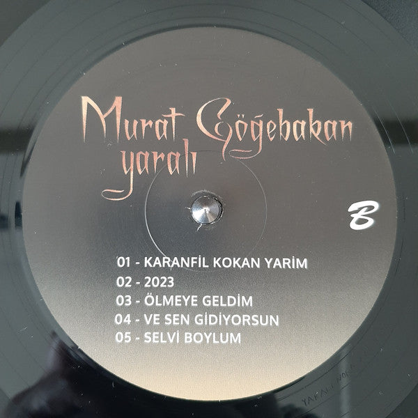 Murat Göğebakan : Yaralı (LP, Album, Ltd, Num, RE)
